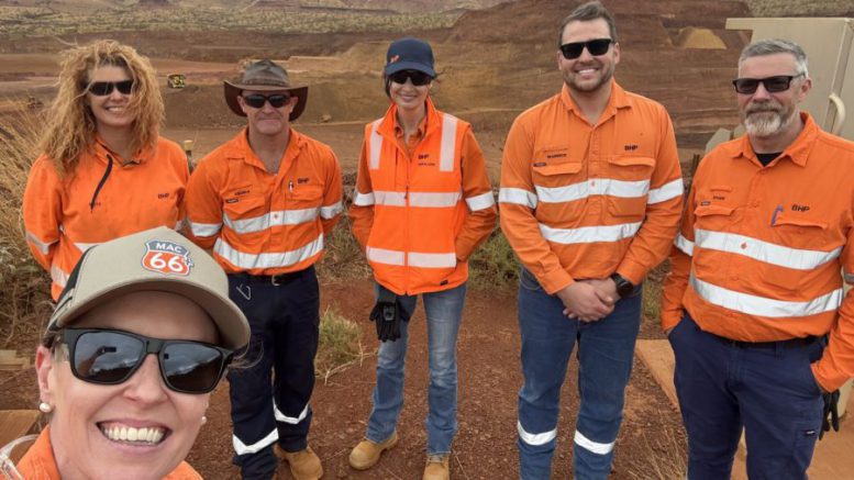 Geraldine Slattery, president of Australia operations (center), with coworkers in the Pilbara region of Western Australia. (Image: LinkedIn profile)