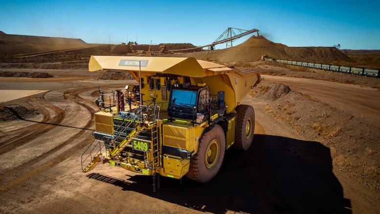 BHP and Rio Tinto test electric trucks to clean up iron ore